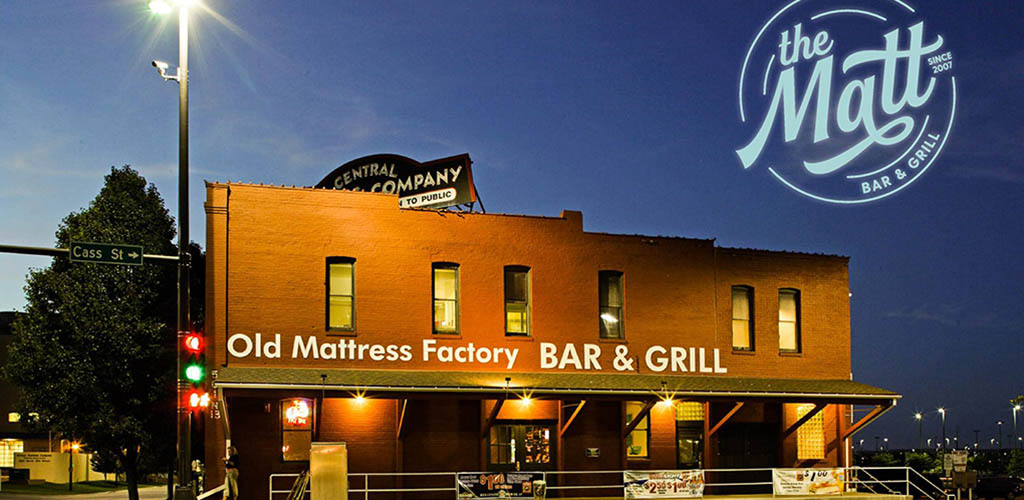 The brick exterior of The Old Mattress Factory Bar and Grill