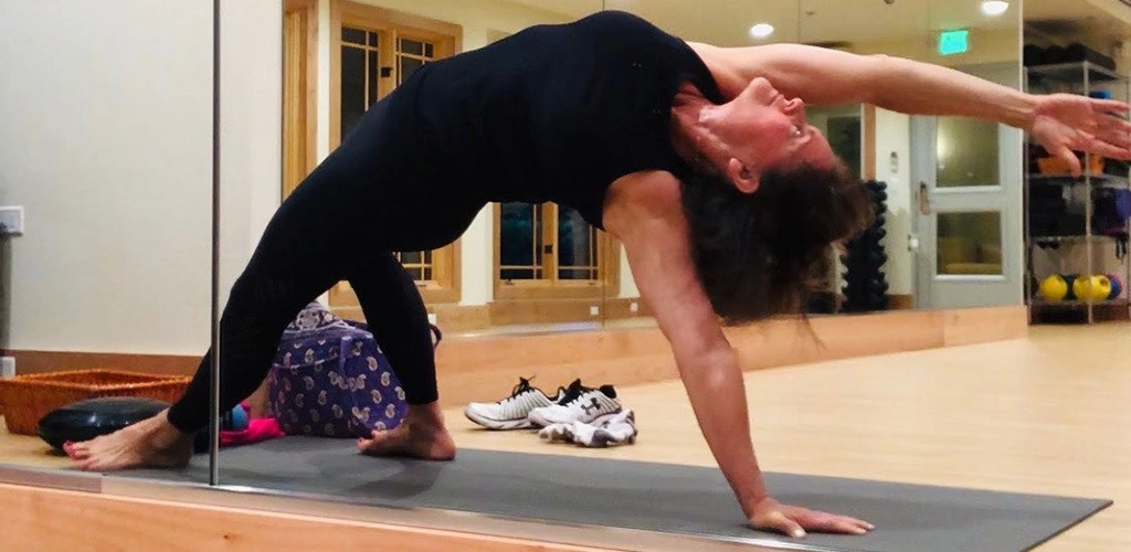 A woman doing yoga at Surya Yoga