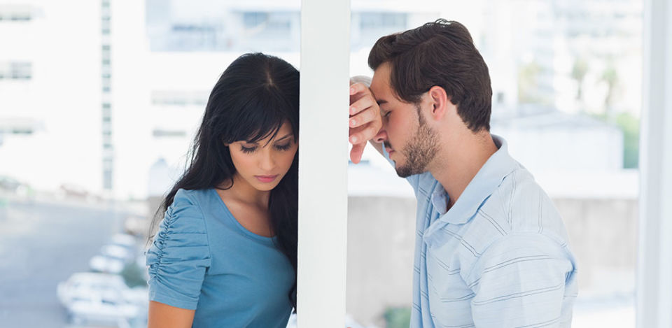 sad couple wondering how to know when their relationship is over