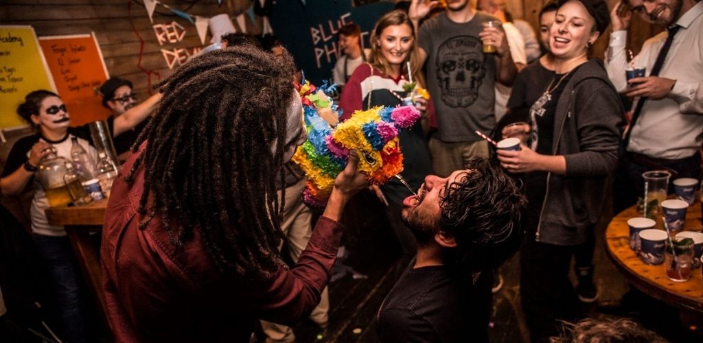 Young Bristol singles having fun at a drinking contest at Red Light