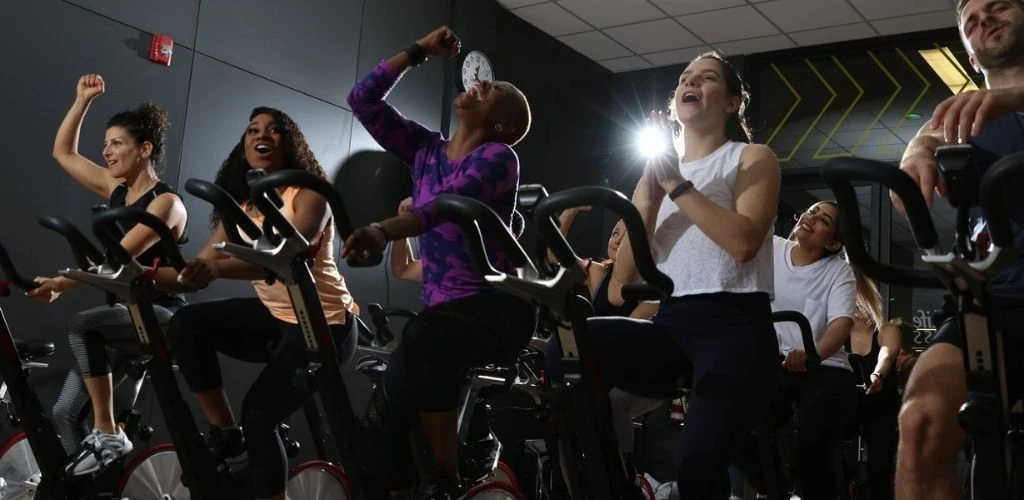 Cute Brampton singles in a spinning class at GoodLife Fitness