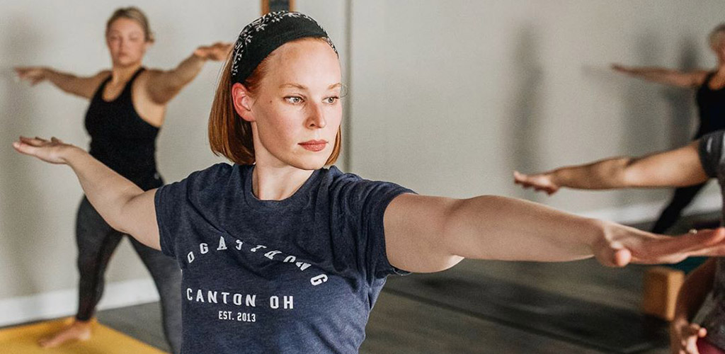 Women doing yoga at Yoga Strong Studio