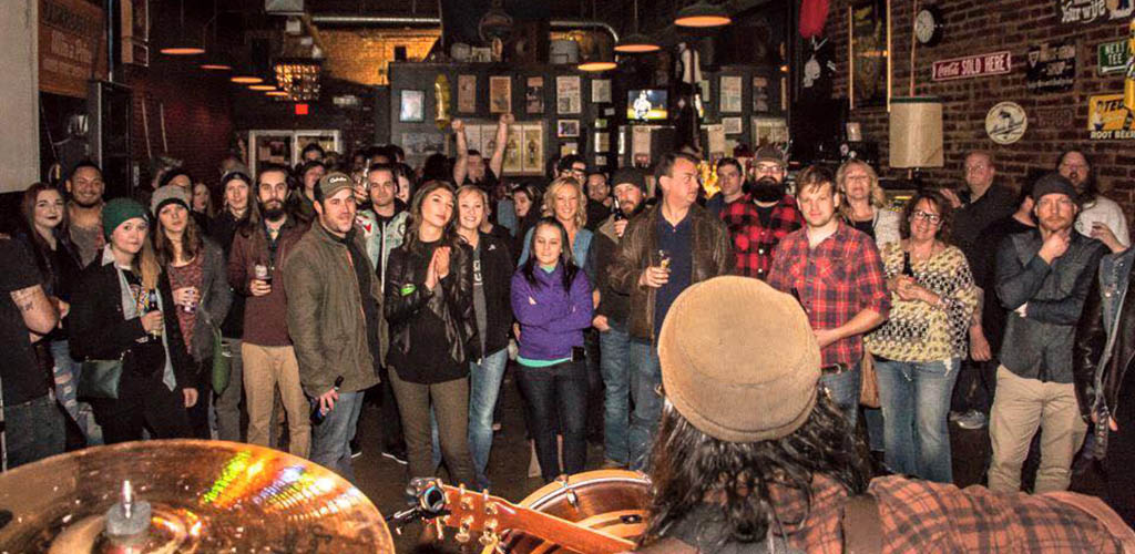 The crowd watching a live rock performance at Lucky's Everyday