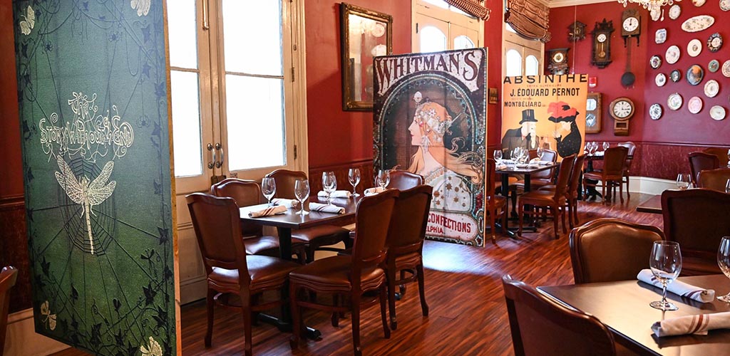 The rustic art-filled dining area of Muriel's