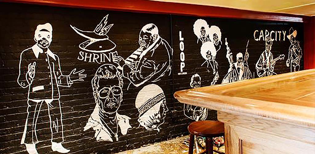 The mural at Showtime Bar