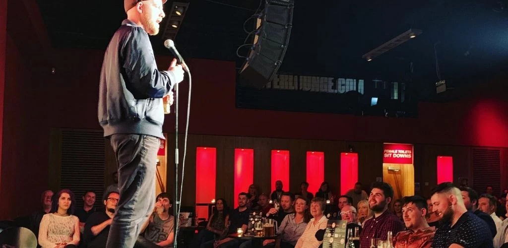 Dublin couples hooking up and laugting during a standup show at The Laughter Lounge