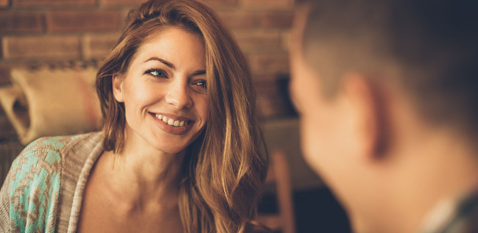 couple flirting after discovering what attracts women to men