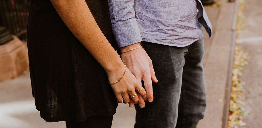 A man escalating touch with a woman and turning her on