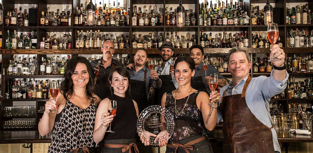 Canon staff celebrating at the bar