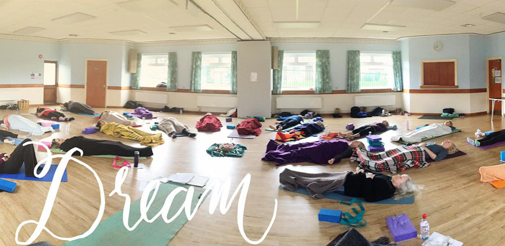 Shavasana position at a class in Blue Lotus Yoga studio