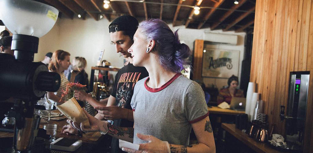 Behind the counter at Three Ships Coffee