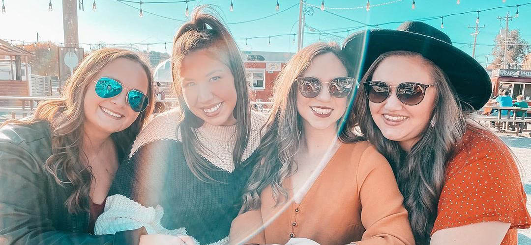 Pretty girls basking in the sun at Bleu Garten