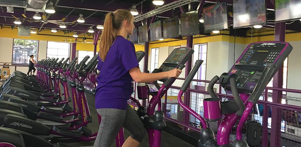 Working out on the elliptical at Planet Fitness