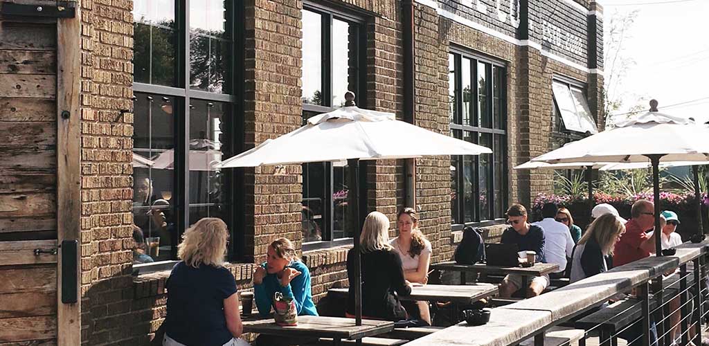 The sunny patio of Spyhouse Coffee