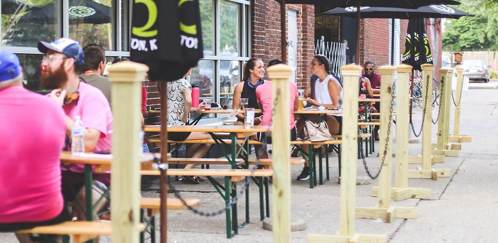 Enjoying the weather in the patio of West Sixth Brewing