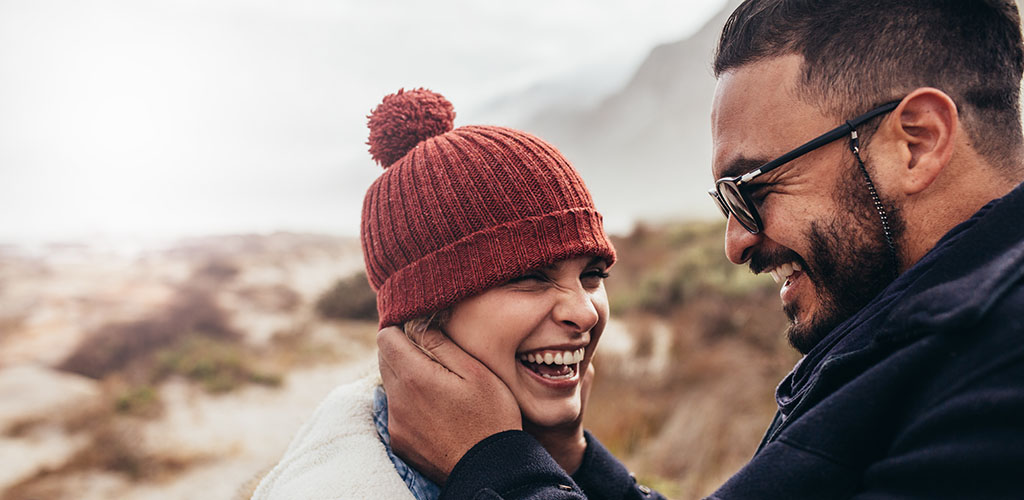 A couple laughing together