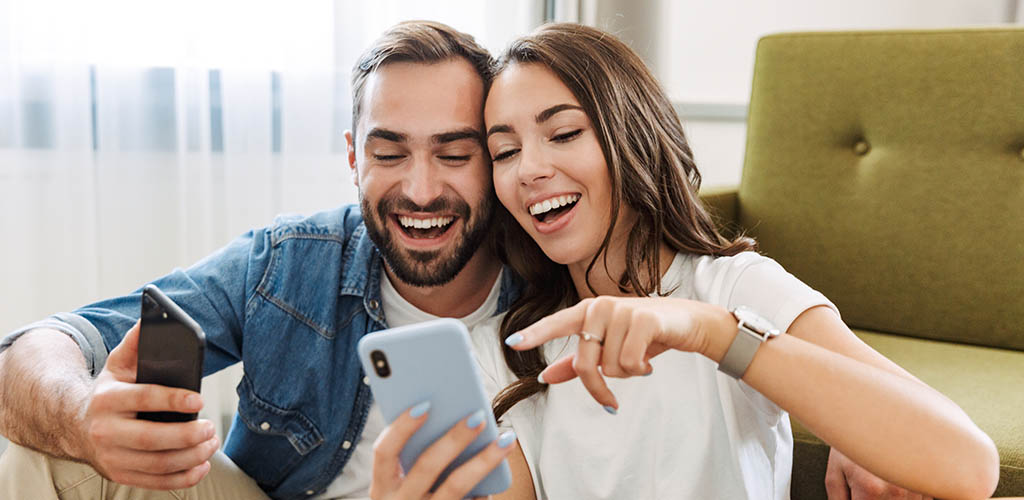 A young man and woman choosing between two scenarios