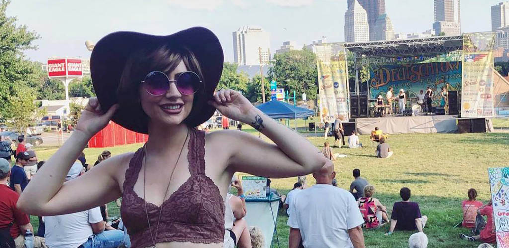 A pretty girl waiting for a band performance at the Deutschtown Music Festival