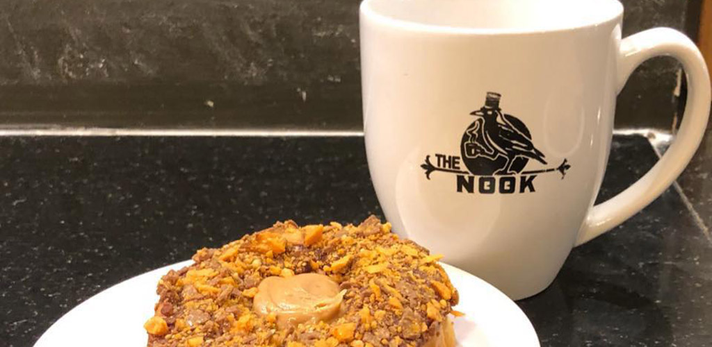 A donut and coffee from Nook Cafe