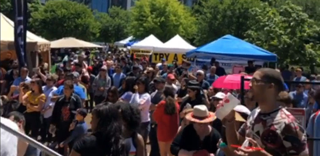 The audience during a live cultural performance at The International Festival