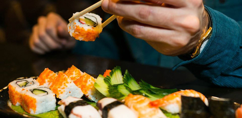 A sushi and sushi roll platter from Cosmo Restaurant