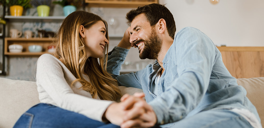 A flirty couple engaged in a conversation