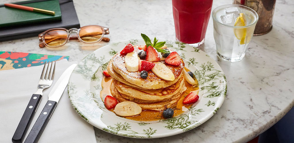 A stack of fruit pancakes from Bill's Restaurant