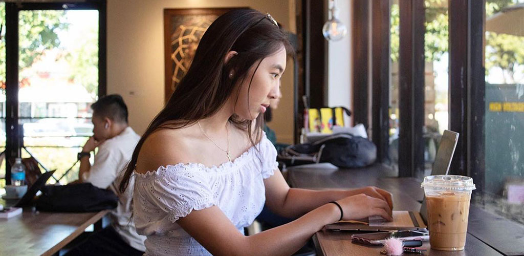 A girl studying at International Coffee