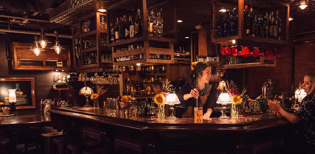 The elegantly lit bar area of The Blind Rabbit