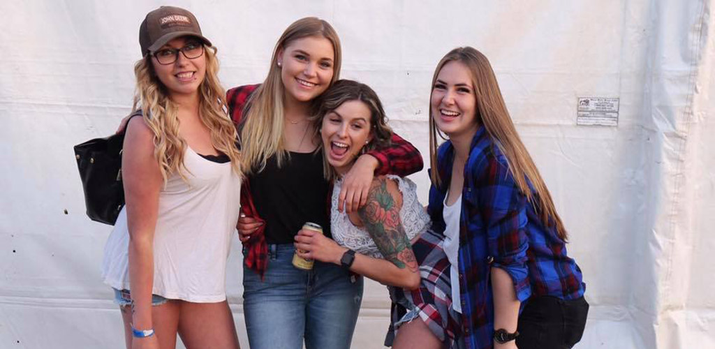 Cute Edmonton girls enjoying the festivities at the Rainmaker Rodeo