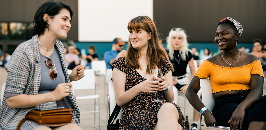 Friends at an event at the Winnipeg Art Gallery