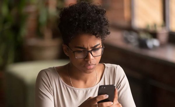 She's texting a guy committing the huge mistakes men make when texting women