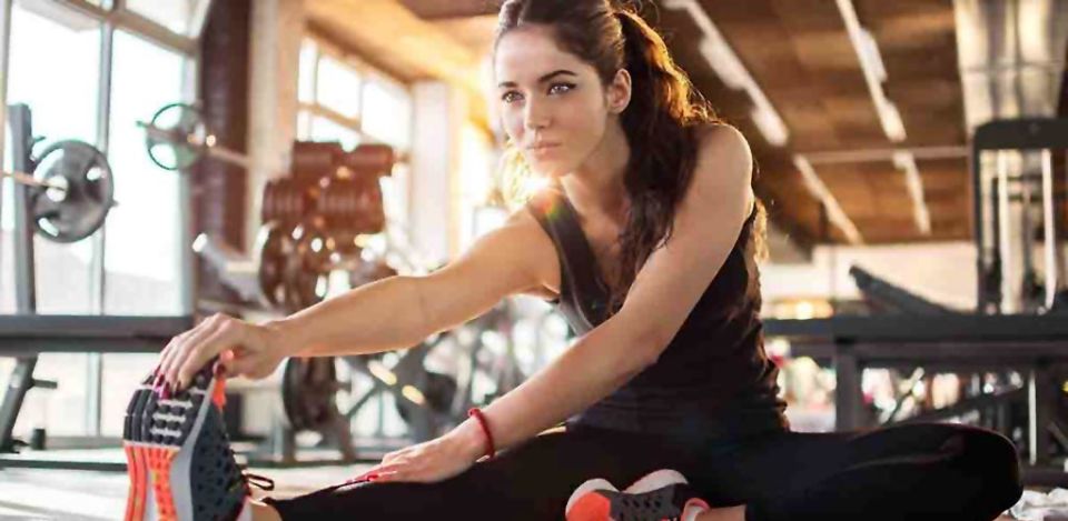 Beautiful fit girl at the gym