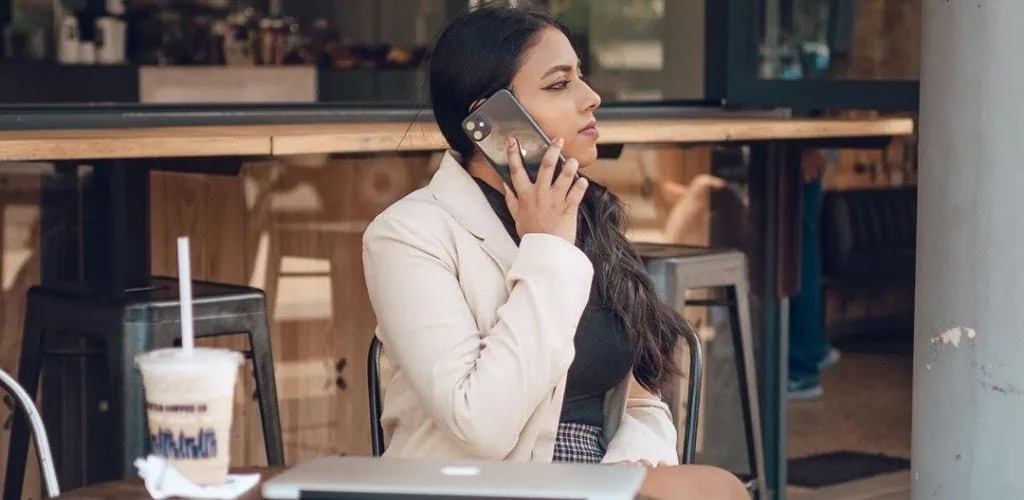 A Seattle MILF on her phone while drinking coffee