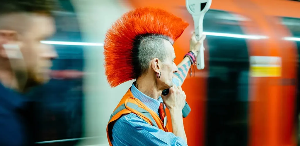 A man with red spiky hair