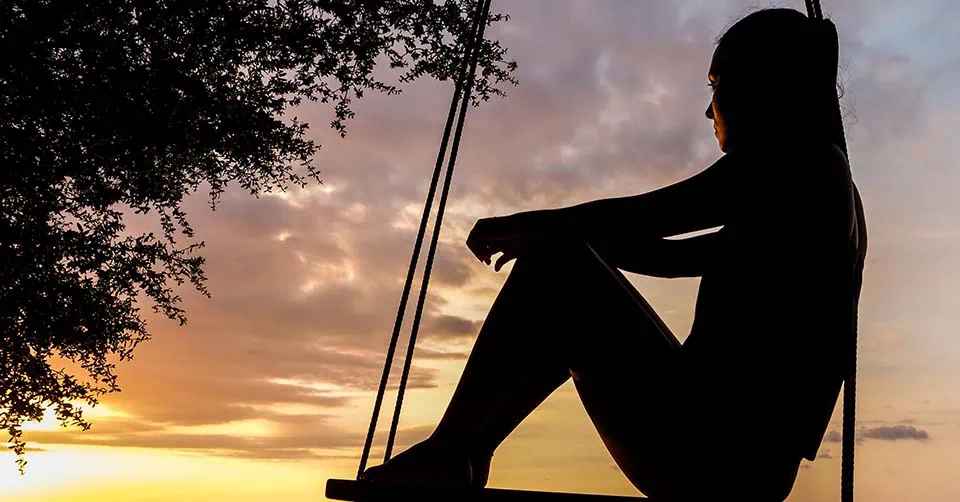 A woman deep in thought