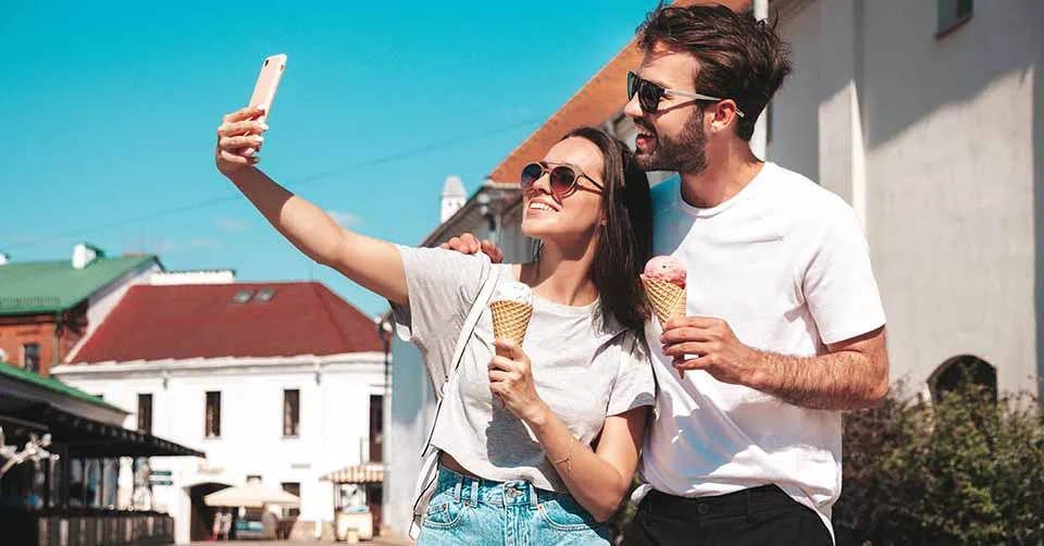 A couple taking their first date selfie