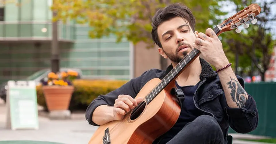 Man playing the guitar