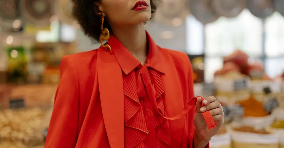 A confident woman in red