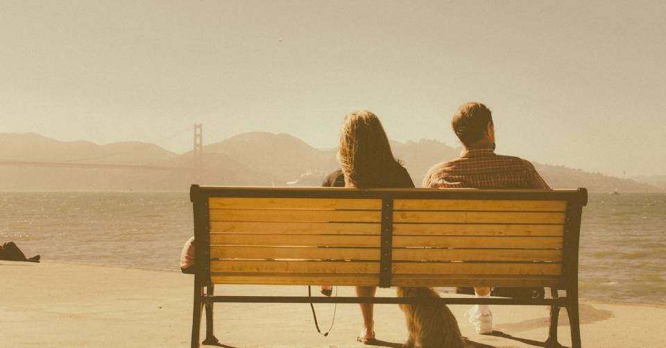 Sitting on a bench resting on a date