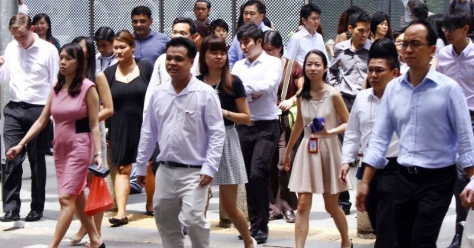 Busy crowd of people walking in Singapore