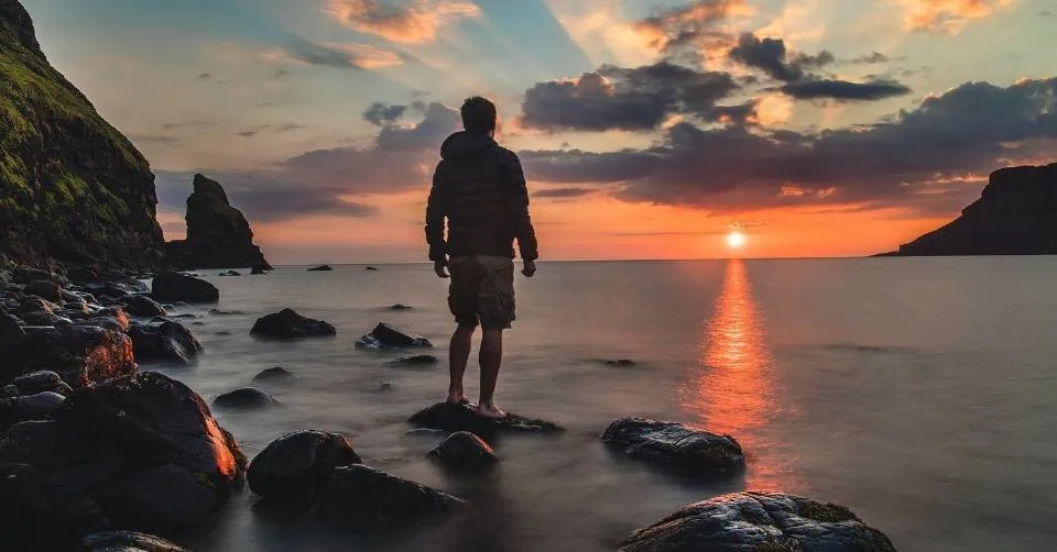 Man looking at a sunset