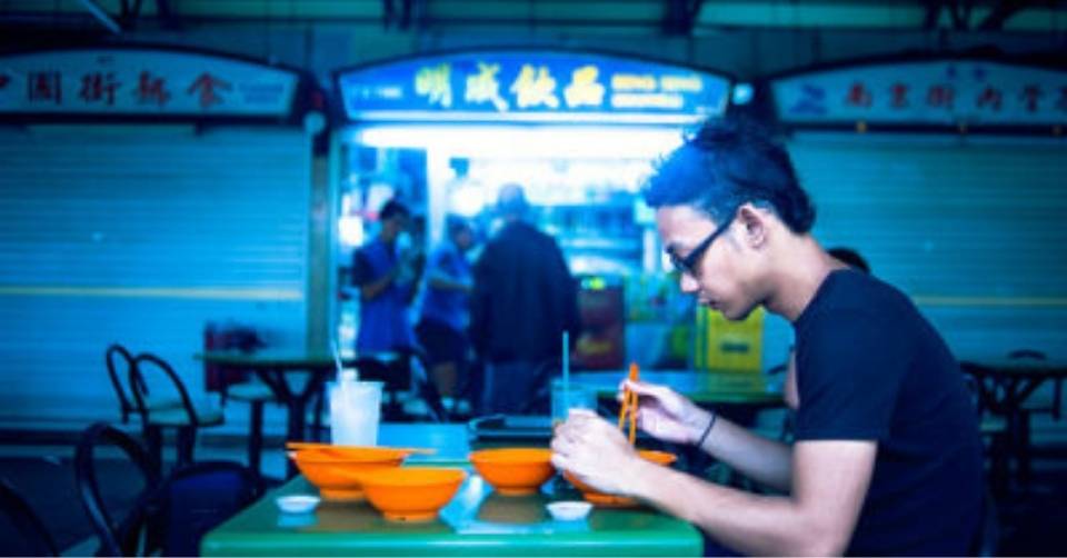 Man sitting alone in Singapore