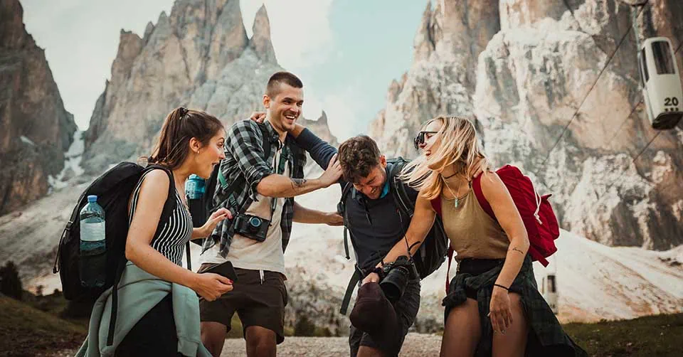 Friendly guy on a hike with his friends