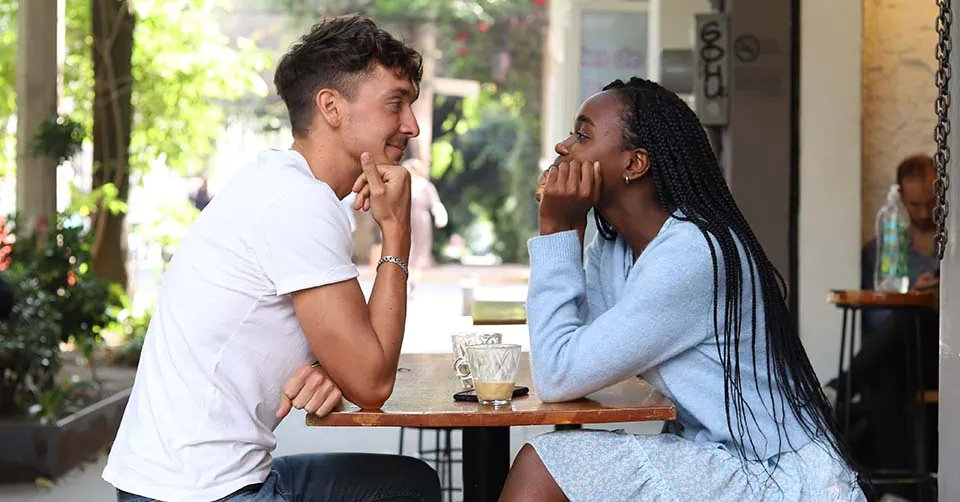 Couple dating in Dallas at a coffee shop