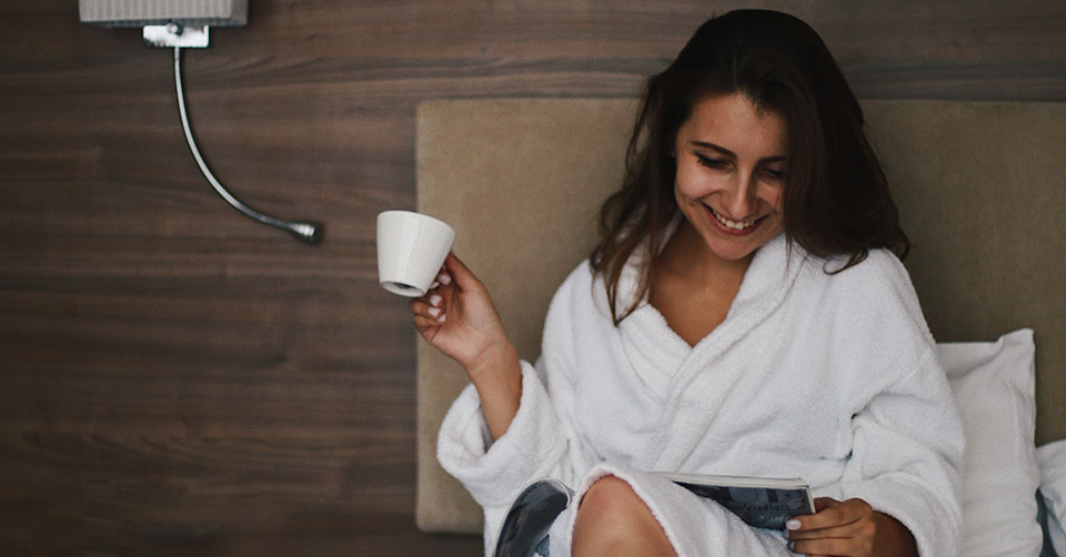 A beautiful woman in a bathrobe