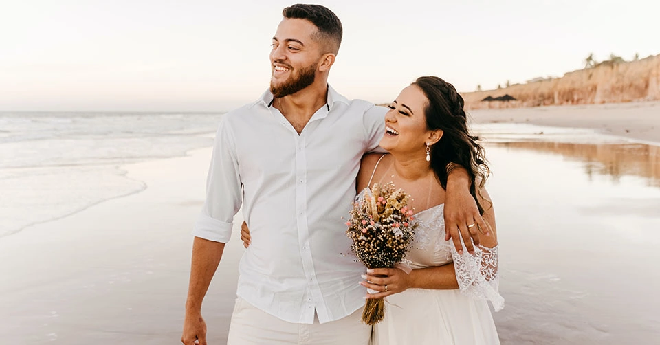 A couple getting married at the beach