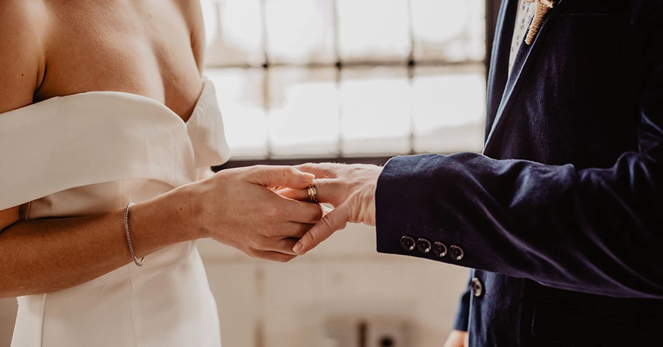 A couple saying their vows at their wedding