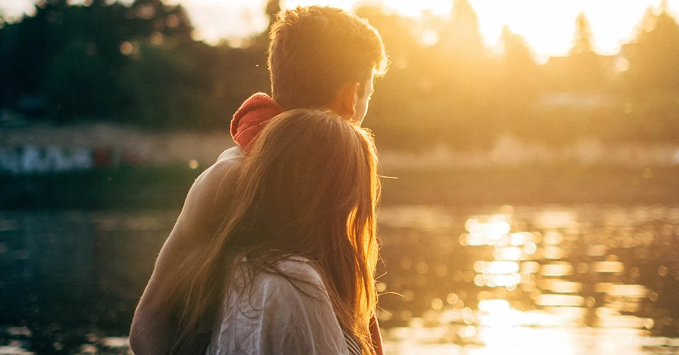 Couple on a date by a river