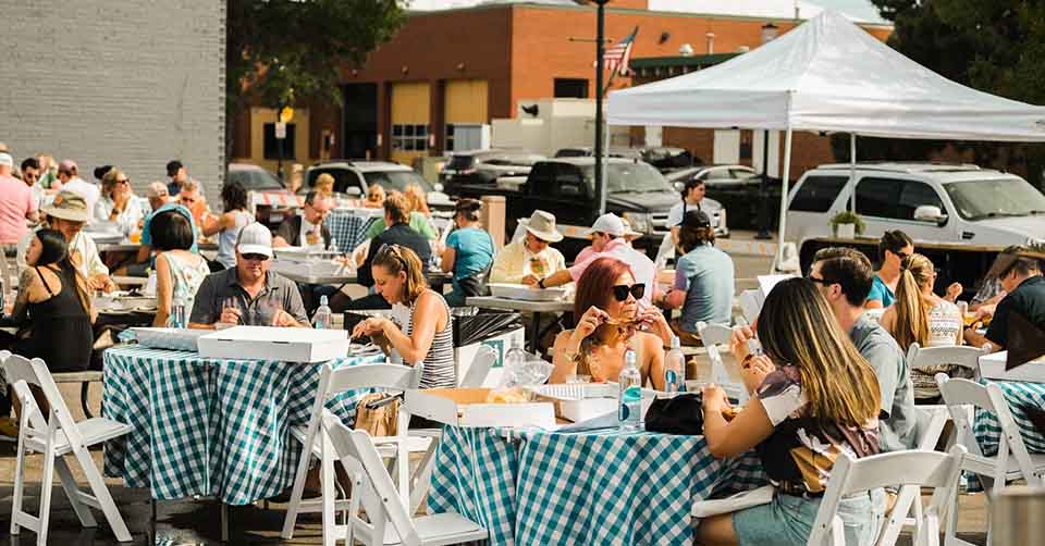 A crowd at Travail Kitchen Brooklyn Park